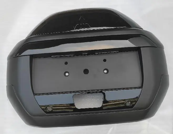 BACK DOOR LICENSE PLATE GARNISH